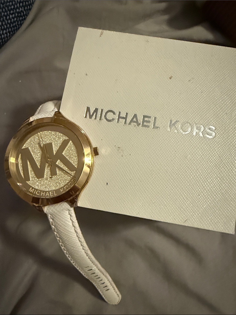 Michael Kors sparkling Gold Tone Watch with White Leather Strap